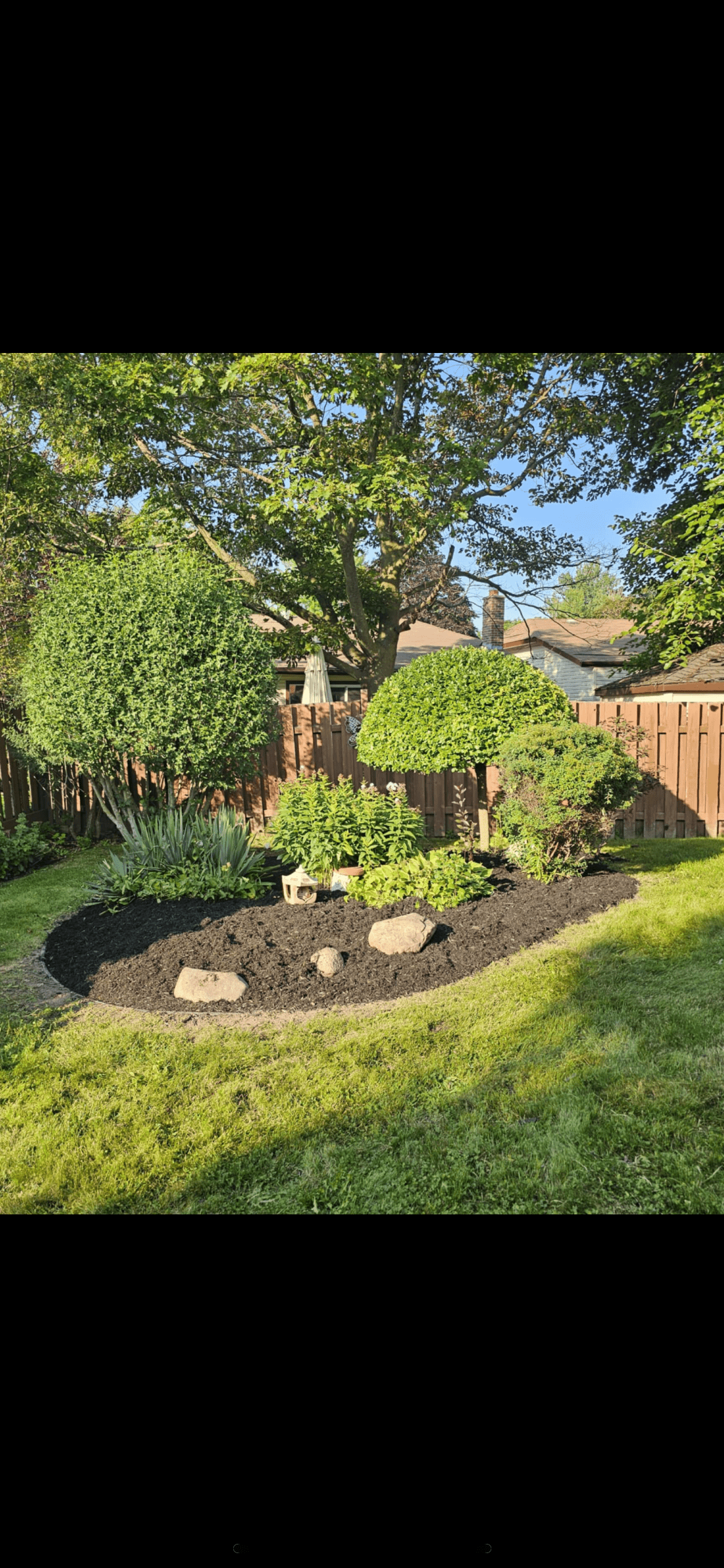 Garden bed landscaping and shrub maintenance